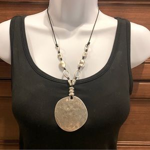 Silver disk statement necklace.  22” adjustable chain